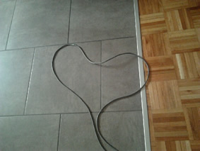 cuore formatosi nel filo dell'aspirapolvere